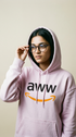 Person wearing a pink hoodie with 'aww' logo on a plain background